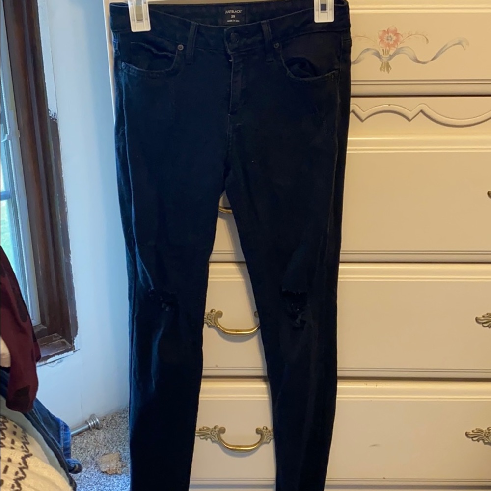 Black distressed denim